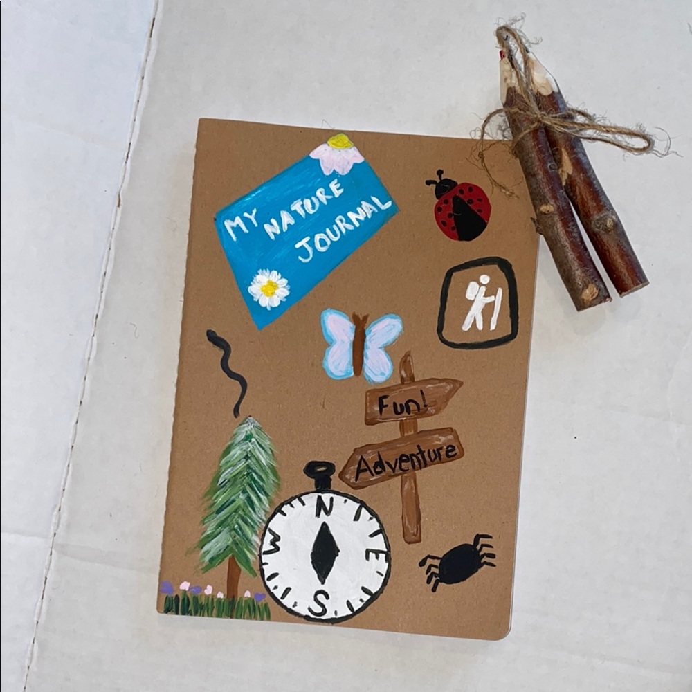 Kids hand painted nature walk lined journal with twig colored pencils
Handmade